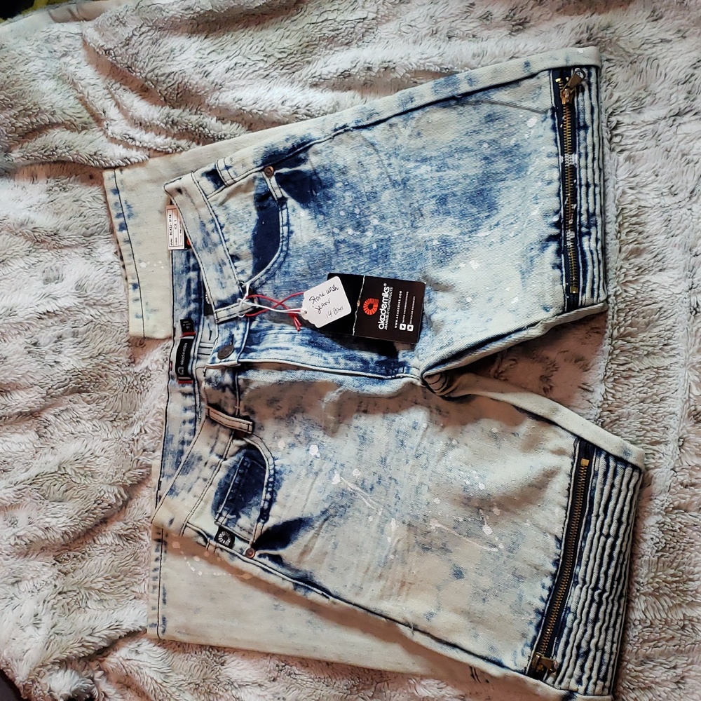 Stonewash denim jeans Bleach, stains with zippers on front